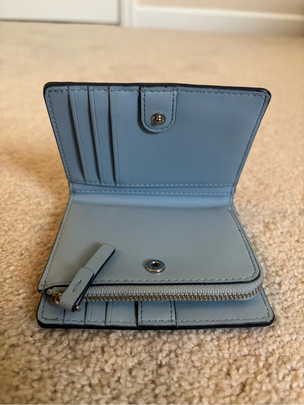 kate spade pale blue leather zip-around wallet